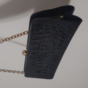 Black and golden clutch